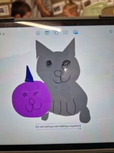 Child's drawing of a cat holding a squishy